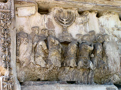 Stone relief depicting  the destruction of the Jewish Second Temple in 70 AD, Arch of Titus, Rome.